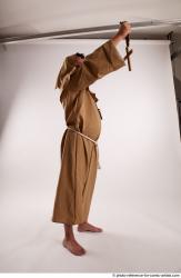 JOEL_ADAMSON MONK WITH CRUCIFIX